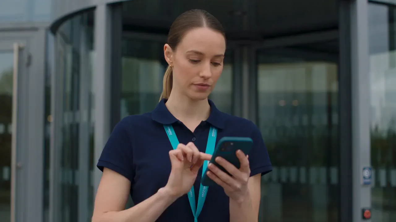 An event worker clocking in by phone and approved time reaching the back office